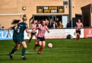 (Photo credits: Chris Fryatt on Alamy. Image of a Sunderland women’s player chasing the ball).